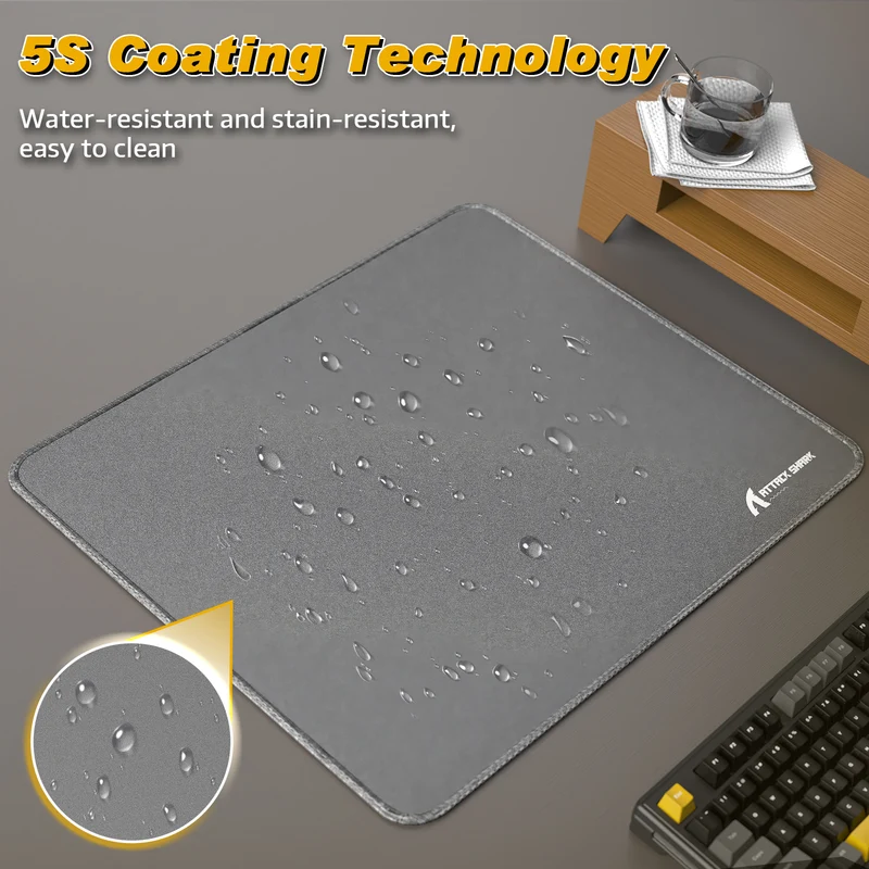Orange Attack Shark mouse pad featuring 5S water-resistant coating and liquid droplets